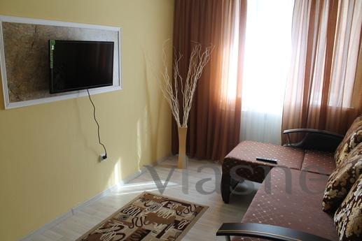 I rent an apartment in a new building. Near the shopping cen