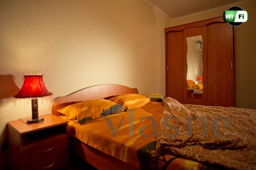 The modern apartment is located in the city center in a new 