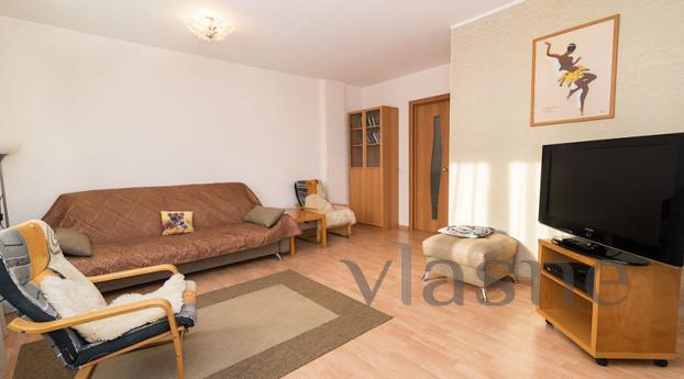 The apartment is fully furnished with modern furniture, equi