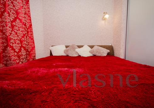 The apartment is located in a new building with fenced yard,