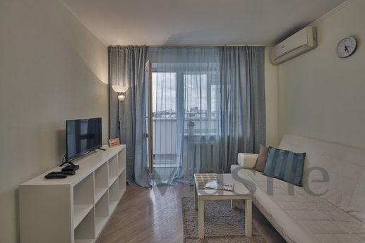 In the new city center, in close proximity to Komsomolsky Pr