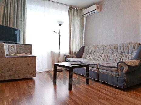 . Stay in a cozy one-bedroom apartment five minutes from the