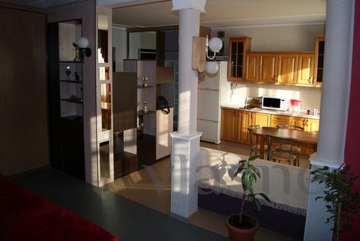 Rent an excellent apartment studio - bright and cozy nights.