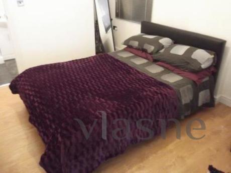 Rent at the clock / SUTKI.Udobnaya bedroom apartment with a 