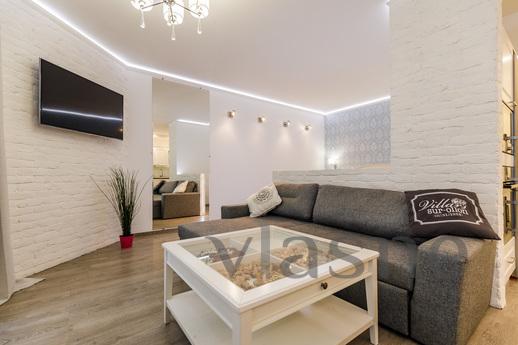 The spacious one-bedroom apartment with a large kitchen and 