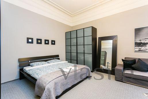 Wonderful studio apartment with an urban interior of muted t