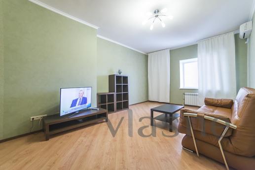 Furniture and other amenities such as a sofa, bed, kitchen, 