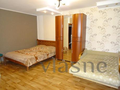 Night, clock, day in a cozy comfortable apartment, located i