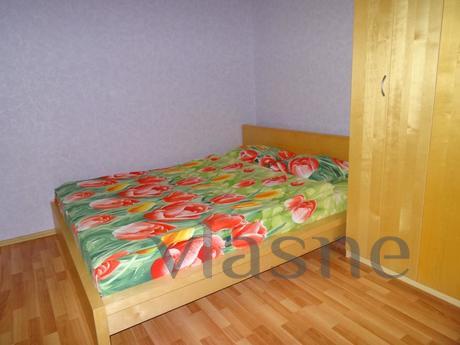 Night, clock, day in a cozy comfortable apartment, located i