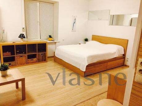 Rent an apartment - studio, modernly equipped and located wi