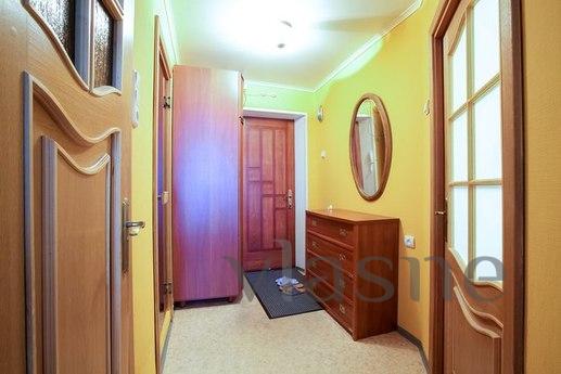 The apartment is located in a warm brick building, a sixteen