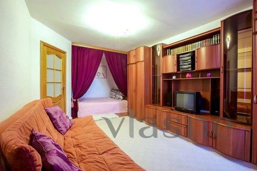 The apartment is located in a warm brick building, a sixteen