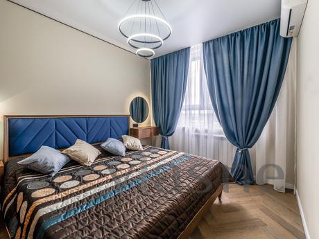 Modern one-room apartment for rent in an area with developed