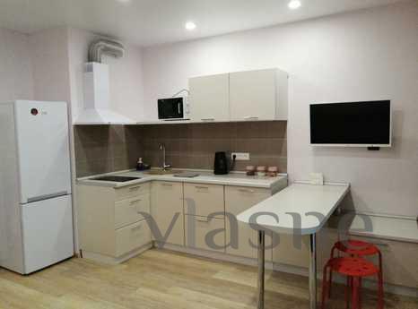 One-room studio apartment is located on the 7th floor of a 9