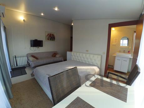 Panoramic 4-seater with a balcony, Kazan - apartment by the day