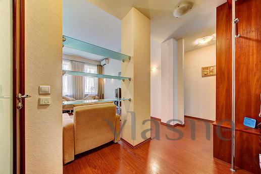 The apartment is located on the third floor of a five-story 