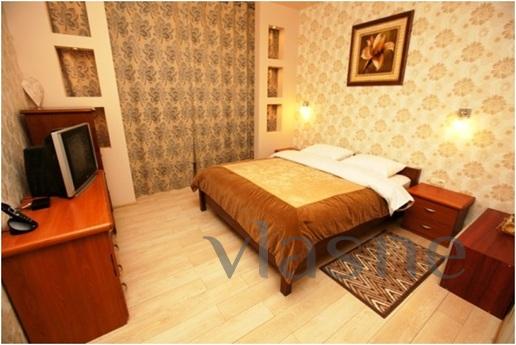 Daily rent two-bedroom apartment in the heart of the city. L
