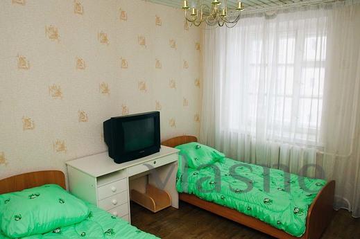 room in a 4-room apartment with a key. each room has two sin