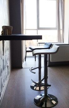 Luxury apartment with panoramic windows on the floor.