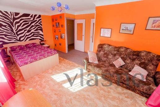 The house is located in the city center, with well-groomed l